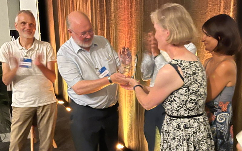 Anthony Newman receiving award